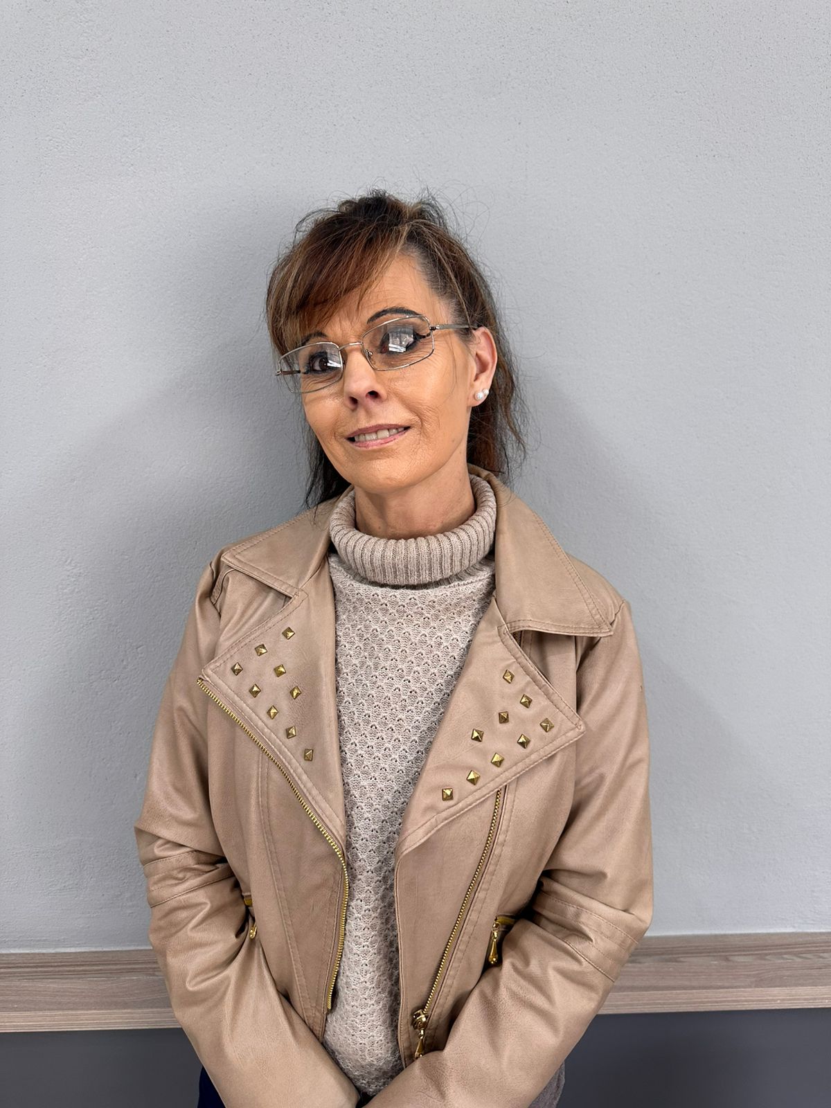 Receptionist welcoming patients